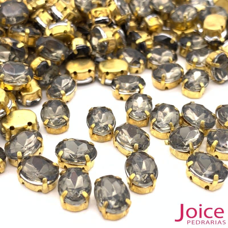 xr:d:DAFLAofDNuE:1200,j:40574241429,t:22111018 Pedra Engrampada Oval Base Dourado 6mm X 8mm C/100unidades - Imagem 1